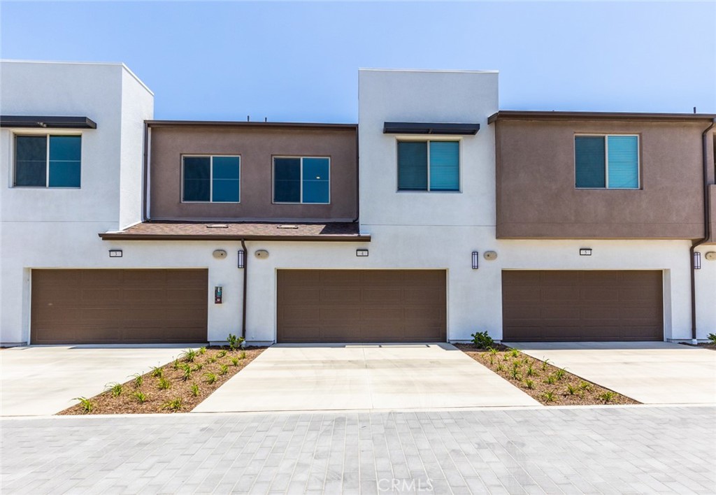 ***BACK ON MARKET NO FAULT OF SELLER****BEST VALUE FOR THE AREA**BEAUTIFULLY UPGRADED MOVE-IN READY + ONE OF THE FEW UNITS WITH A FULL LENGTH DRIVEWAY*** Welcome to the perfect blend of upgrade and convenience. This High Performance Home is full of all of the bells and whistles. Full of home automation technology, a true smart home. Conveniently located for those who live life on the go or for those who like to stay / work from home. Walk through your private courtyard, perfect for bbq, get togethers or relaxing and into your bright and modern floorplan. Featuring 3 bedrooms, 2.5 bathrooms, fresh paint, upgrades throughout including custom wood like tile flooring, recessed lighting and smart features. Downstairs, the great room is perfect for entertaining including  an open living area that seamlessly flows into your dining area with separate sliding glass door offering patio access, upgraded kitchen with designer backsplash, pull out drawers, upgraded cabinetry, center island with breakfast counter, fridge included and ample storage. Upstairs features spacious secondary bedrooms, laundry room with washer and dryer included, master suite with beautiful views, en-suite master bathroom with dual sinks and walk in closets. Solar on property to help with those California utility bills,  One of the few units with a full length driveway! Located close to 60/15/10 freeways, major shopping including Costco, grocery stores and new shopping centers as well as parks. Hoa amenities include Gated Lap Pool area with separate kiddie pool and spa, 2 dog parks, kids tot park, scenic walking trails, bbq area and more!