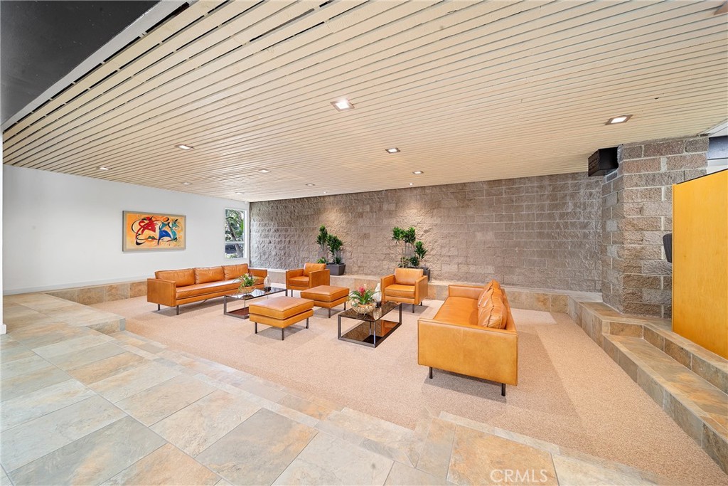 Welcome to Sherman Villas! Cut your gym membership! sell your car, walkability score is OFF the charts! The Most Luxurious Buildings in Sherman Oaks! Absolutely One of the BEST locations, SOUTH of the Blvd. Surrounded by Multi-Million Dollar Homes. Featuring circular driveway, inviting well-lit pristine mid-century modern lobby, Mature Trees, Secure main entrance, security cameras, gated parking (with two reserved tandem spaces plus EV-charging ready)! is truly resort living! with pool and spa, community GYM & community room. Double door entrance leads to expansive, open living room and HUGE enclosed patio (not included in the square footage).  This Rarely available highly desirable interior unit that overlooks beautiful resort like courtyard with only ONE common Wall! Has an incredible indoor/outdoor feel like no other on the market! Every window in the unit brings in an abundance of light and overlooks calming greenery & grounds! Some of the unit features: newer wood style laminate flooring throughout and is well maintained, just needs your personal touch! True Formal Dining & Cook’s Kitchen.   2 oversized bedrooms including primary bedroom w/large floor-to-ceiling window, dressing area, two closets (inc. 1 walk-in) & en-suite bathroom. WASHER/DRYER HOOK UPS can easily be installed IN THE UNIT!  This unit is WELL PRICED and ready to GO! Just check out the COMPS for yourself…. The location is in Proximity to the BEST Sherman Oaks has to offer, incredible restaurants, markets (Whole Foods!), shops, and more!! Easy Westside and freeway access!