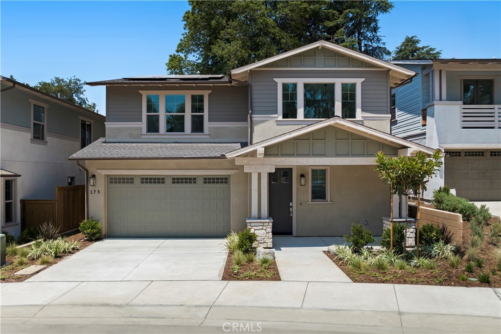 RARE OPPORTUNITY-BRAND NEW CONSTRUCTION IN ALTADENA!  Introducing The Oak Grove of Altadena built by renowned builder, Warmington Residential.  This beautiful home is one of only 16 offered in this exclusive new Craftsman-inspired neighborhood.  Large Oak trees surround the cul-de-sac neighborhood with the picturesque foothills serving as a backdrop.  This home offers 4 bedrooms with one on the main floor, 3 full baths, and many modern upgrades throughout including wood flooring, designer curated tile and quartz finishes, painted finish shaker-door cabinets with extensive cabinet features in living areas, Quartz kitchen countertops with large island, luxury Bertazzoni appliances including the refrigerator, beautiful precast fireplace at Dining Room, free standing tub in primary bath, modern champagne-gold plumbing fixtures, designer selected lighting fixtures throughout, Ring Pro Doorbell and many smart home features to make this home fully turn-key.  The stacking glass doors opening to the backyard loggia create a true indoor/outdoor living experience to enjoy at the end of a busy day.  Don't miss this special opportunity to own a beautiful new home with the highly desirable Altadena address.