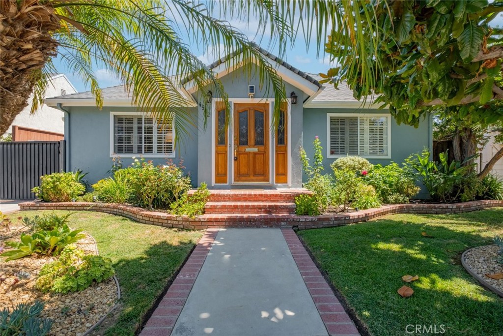 Welcome to 4522 Calhoun Ave, located in the charming neighborhood of Sherman Oaks. This inviting two-story single-family home features 4 bedrooms and 3 bathrooms, spread across 2,380SqFt of living space. The property boasts several upgrades, including a new roof and fully paid-off solar panels. A detached 2-car garage and ample driveway parking provide convenience and plenty of space. As you enter, you’ll be greeted by a cozy living room with a charming fireplace, perfect for entertaining guests. The adjacent dining room offers plenty of space for enjoying meals, while the well-equipped kitchen includes essential appliances such as a dishwasher, refrigerator, gas stovetop, and oven. A den nearby provides easy access to the backyard, and a dedicated laundry area is conveniently located nearby. The main floor features a versatile bedroom with an en-suite bathroom currently used as an exercise room, along with two additional bedrooms—one serving as an office and the other offering ample space for your needs. Upstairs, the primary retreat includes a generously sized walk-in closet and a cozy nook with its own fireplace. The en-suite bathroom features a separate shower and bathtub, as well as double sinks. Additional amenities include central air and heating. The home is ideally situated close to the 101 freeway, Westfield Fashion Square, Trader Joe’s, restaurants, markets, and more. Don’t miss out on this exceptional property!