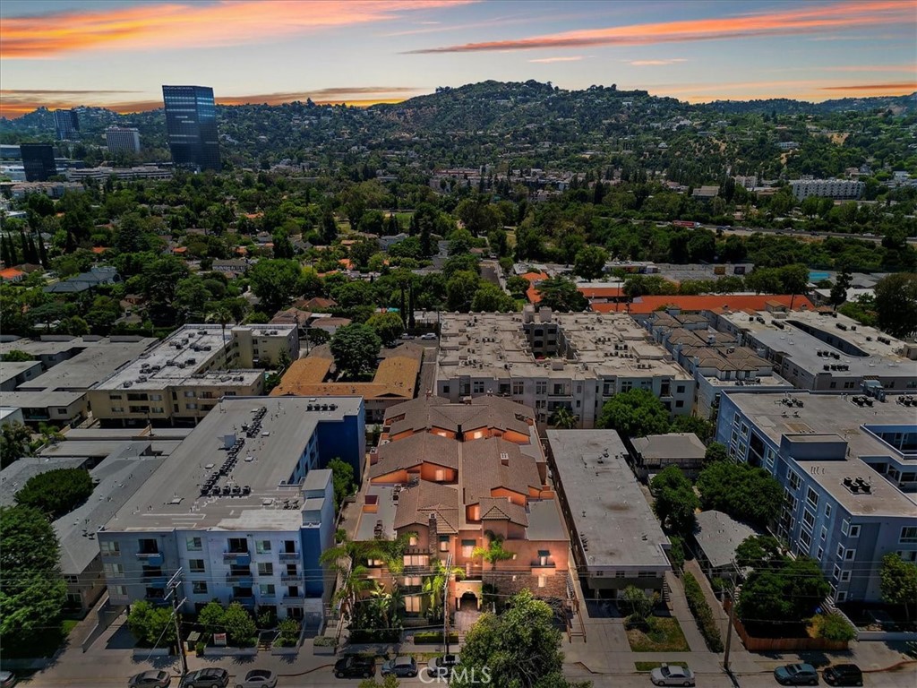 Discover the epitome of urban living in this phenomenal Tuscan style community nestled in the vibrant community of Toluca Lake. This turn-key property features a charming bistro-style kitchen offering stainless steel appliances, upgraded cabinets and granite countertops. The kitchen effortlessly flows into an oversized open-concept living space, perfect for entertaining or relaxing by the ambient fireplace. The primary bedroom is roomy and offers an open exterior patio, huge personal closet and a gorgeous en-suite with dual sinks, and a separate tub and shower area. Did I mention it has its own full size laundry area? This residence has been meticulously maintained and cared for. Whether you're enjoying a quiet evening at home or exploring the local shops and dining options, you'll find everything you need right at your doorstep.