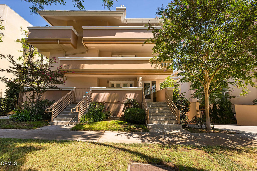 Take advantage of this great opportunity to purchase a stunning one bedroom top floor pied-a-terre in a prime location. Upon entering the home, a spacious living room w/ fireplace opens to an expansive private patio. The dining area is adjacent to a bright kitchen w/ abundant storage and stainless steel appliances. The bedroom does not share any common walls with neighbors and has custom shelving in the closet. Additional features in this cozy home include plentiful light, crown moldings, plantation shutters and new flooring/paint. Community laundry is right next door on the same level and the unit has two reserved subterranean parking spaces. The complex is one short block away from restaurants and shops in the South Lake District and minutes from freeways, the Gold Line, Paseo Colorado and Old Town Pasadena.