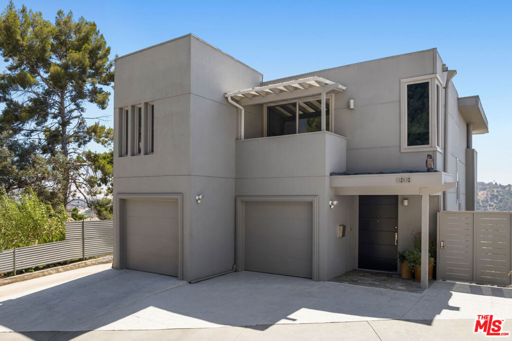 In serene Mt. Washington, this spectacular Modern delivers the best of California living with light-filled spaces and breathtaking views. The open-plan layout has a generous quality with towering ceilings, clerestory windows and glass sliders extending the space to the deck, a breezy space to savor the vistas over morning coffee or evening cocktails. Custom Italian cabinetry and Viking and Bosch appliances elevate the kitchen; wood flooring runs throughout. Three bedrooms include the airy top-level Primary, and there is a versatile loft for setting up your home office or gym. Enjoy scenic views stretching into the distance, including fireworks over Dodger Stadium, and a backyard with potential for future design. Amenities include central AC, laundry room, and a spacious garage. Pick up a bite or brew at your local favorites Barra Santos, Loquat Coffee and Saint-Raf Bagels, and explore the nearby Elyria Canyon trails for a perfect day out.