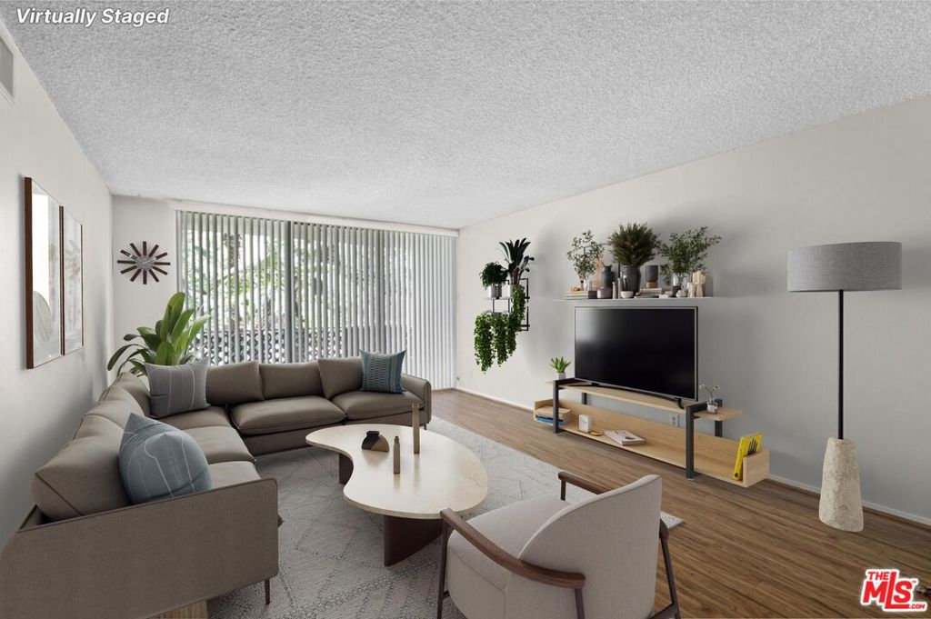Welcome home to an amazing value and enjoy living in PRESTIGIOUS TOLUCA LAKE! This beautiful corner unit offers a modern update with fresh paint, updated kitchen and floors featuring granite countertops, soft-close cabinets, and pull-out shelves. ~ Enjoy the secured community with a POOL, gym, and clubhouse, all conveniently located near major freeways (101, 170, 134) and studios like Warner Bros., Disney, Universal, and NBC. Special features include central AC/heat, elevator access, garbage chute, pet-friendliness, and HOA fees that include EARTHQUAKE INSURANCE, water, and main AC unit maintenance. ~  Plus, with two dedicated parking spaces, storage, walkable access to shops, restaurants, and Trader Joes, you will have comfort, convenience, and style  all in a prestigious location! Don't miss out!