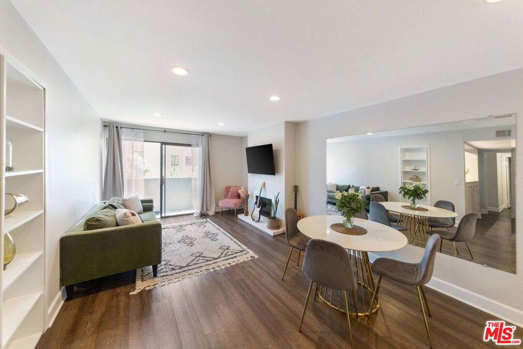 Welcome to this stunning 2-bedroom, 2-bathroom condo located at 1940 N Highland Avenue. Boasting 1,042 square feet of living space, this sophisticated residence offers a luxurious urban lifestyle in a prime location.As you step inside, you'll be greeted by a spacious and bright interior. The living space seamlessly flows into the modern kitchen, complete with stainless steel appliances and ample storage. The primary bedroom is a tranquil retreat with an en-suite bathroom, while the second bedroom offers flexibility for guests or a home office.This condo provides access to an array of exceptional building amenities, including a pool deck, sauna, spa, gym, and a common media/recreation room. The outdoor barbecue area is perfect for entertaining and enjoying the beautiful California weather. With assigned parking and guest parking, convenience is at the forefront, and the building's elevator adds an extra touch of ease to daily living.Located in the heart of Los Angeles, this condo offers a vibrant and dynamic lifestyle with easy access to the city's renowned dining, shopping, and entertainment destinations. Don't miss the opportunity to experience the best of urban living in this remarkable condo. Schedule a showing today and make this stunning property your new home!