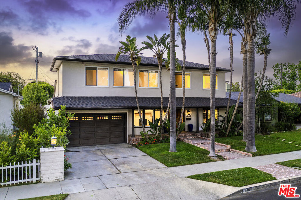 Sun-kissed Mediterranean Villa in the heart of Toluca Lake. Pristine 3,000 sq. ft. 4 + 3. The warm architectural style is reflected in the custom Spanish iron-and-wood door, brick veranda, and arch to the grand living room with fireplace and gleaming hardwood floors that continue to the formal dining room.  Details include crown moldings and built-ins. The spacious family room glows from Saltillo tile and natural light from the wall of windows showcasing a private paradise with a custom pool, spa, waterfall, covered patio, and built-in outdoor BBQ area. Bright remodeled gourmet kitchen features Wolf range, Sub-Zero fridge, walk-in pantry, and adjoining laundry room. 3 bedrooms are located downstairs, and the Main deluxe suite upstairs incl. walk-in closets, a dressing area, a remodeled bath with separate vanities, jetted tub, a shower and bidet. Pre-wired for high-speed internet, security system, and surround sound. 6,022 sq. ft. lot. Near Toluca Village and West Side.