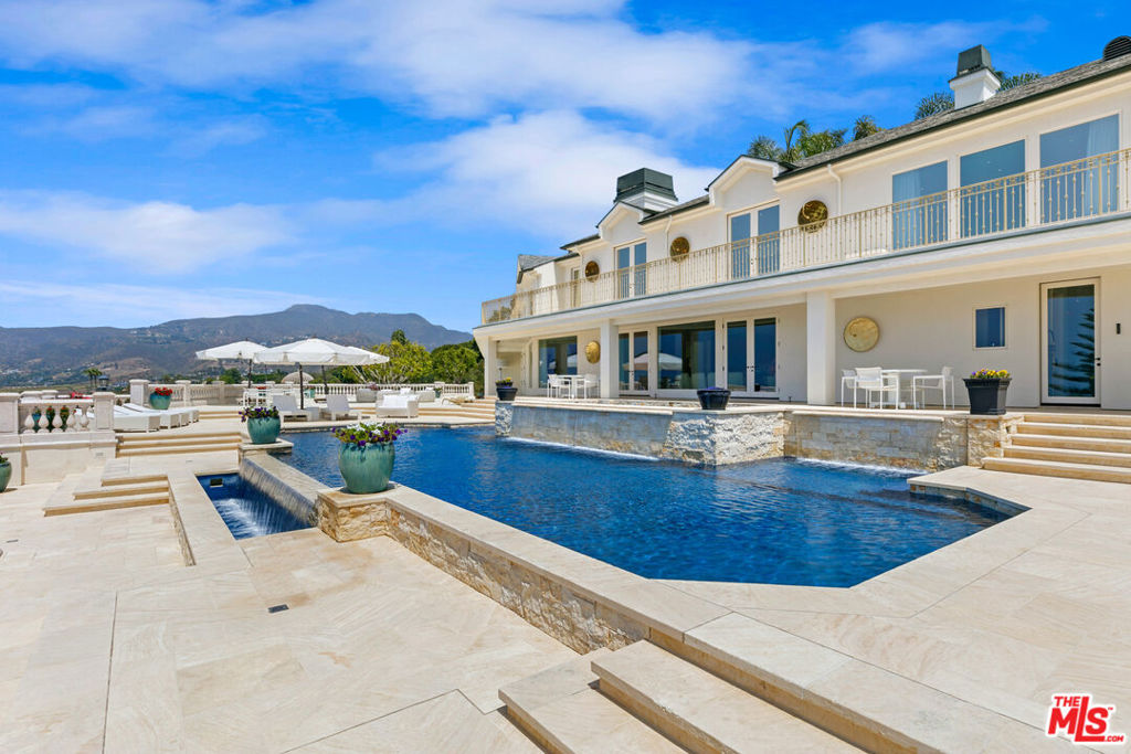 Four Seasons meets Malibu:  Stately and majestic, this legacy estate sits on approximately 5 acres of manicured grounds, with expansive ocean & coastline views.  Wide open patio spaces surrounding the infinity pool & spa, allows for large parties.  The interiors have the highest level appointments, with the finest stone, venetian plaster, Murano glass fixtures, electronics and security.  The primary suite is expansive with a sitting area, balconies, private dressing area and large bath.  All of the guest rooms are ensuite with views and balconies.  There is a home theater, a gym, billiards & recreation rooms providing endless entertainment.  The grounds offer two tennis courts, a soccer field size lawn area, over 30 fruit producing trees, a carefully sculpted rose garden, koi and a turtle pond, waterfalls & fountains.  The property is completely private, with gates and surrounding concrete walls.  The motorcourt can park 25+ cars.  The house includes a maids room plus a separated caretaker apartment.  This is an extremely rare offering for Malibu- the square footage can never be duplicated.  The property consists of three legal parcels and may allow for additional development.