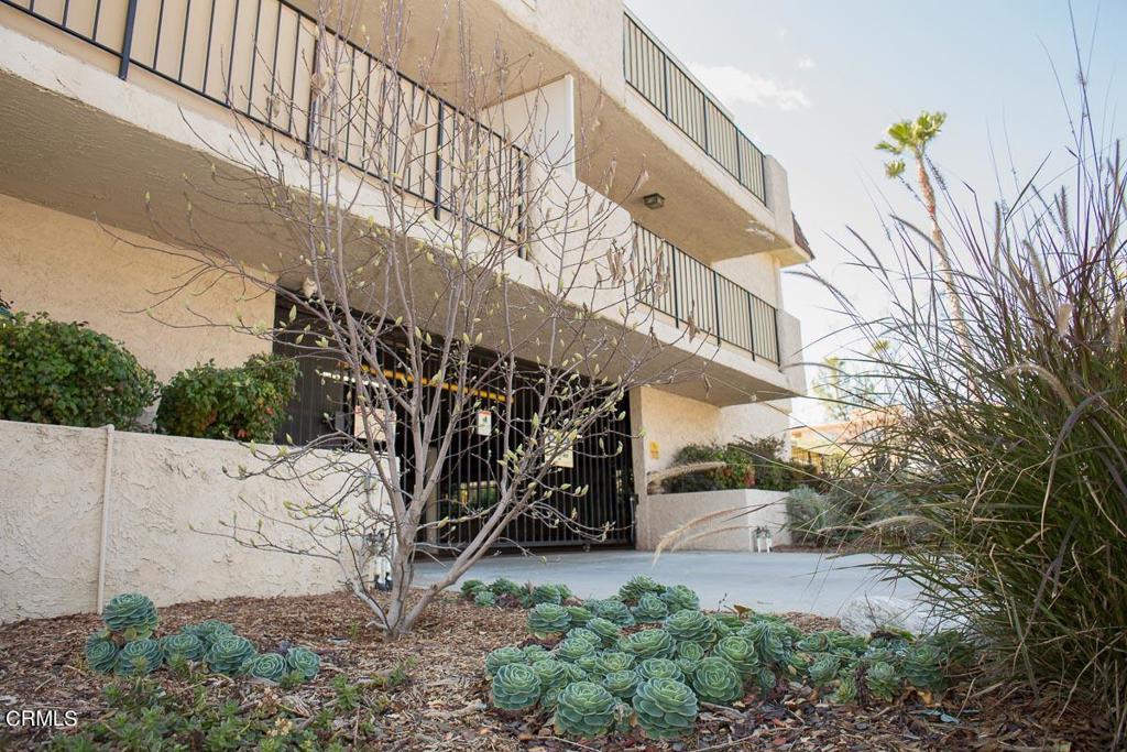Super-cute, top floor, single level, newly renovated condo in a great location. This home has lots of storage and a huge living room that is open to the dining area and kitchen. Wonderfully light and bright, the living room has an east-facing wall of glass that includes a sliding glass door which opens to a large balcony with views of the San Gabriel mountains. One block to a grocery store, restaurants, a library, a gym, dry cleaners, a car wash, transportation and more. There is one parking space in the gated garage and street parking available without the need for a permit.  Brand new gas stove and hood, kitchen sink, faucet, counter tops, dishwasher, laminate wood-like flooring, light fixtures; fresh paint throughout; the central air and heat unit was replaced two years ago. Refrigerator included! Move right in and enjoy!