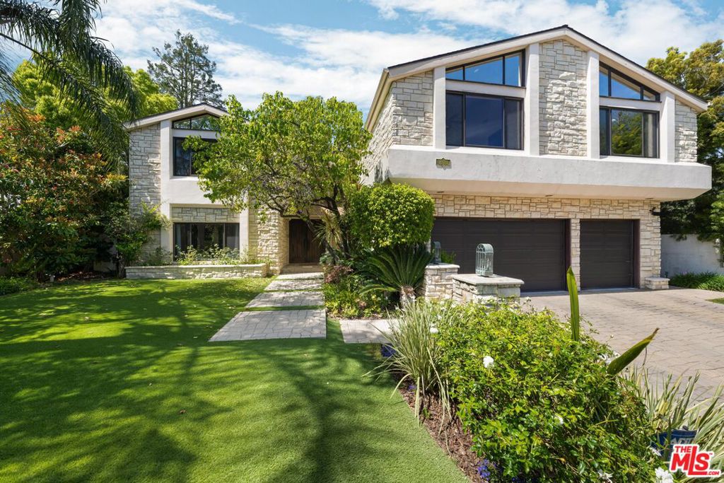 Perched in an idyllic setting at the end of a tranquil, double cul-de-sac in the prestigious Benedict Hills Estates of BHPO, this two-story, 6-bedroom contemporary home offers unparalleled panoramic mountain and canyon views that are simply second to none. From the elegantly designed outdoor dining area to the luxurious pool and jacuzzi, every corner of the backyard invites you to bask in the breathtaking scenery. The residence combines modern sophistication with eclectic charm, featuring a spacious chef's kitchen that seamlessly opens to a cozy family room, along with separate dining and living areas adorned with striking beamed ceilings and unique architectural designs. The upper level hosts a lavish primary suite with a spa-like bath, an attached office, and a walk-in closet, plus four additional expansive bedrooms. This inviting family home is located just minutes from the heart of Beverly Hills and close to top dining spots and markets, nestled within the highly coveted Warner Elementary School District, ensuring a perfect blend of style, comfort, and exclusivity!