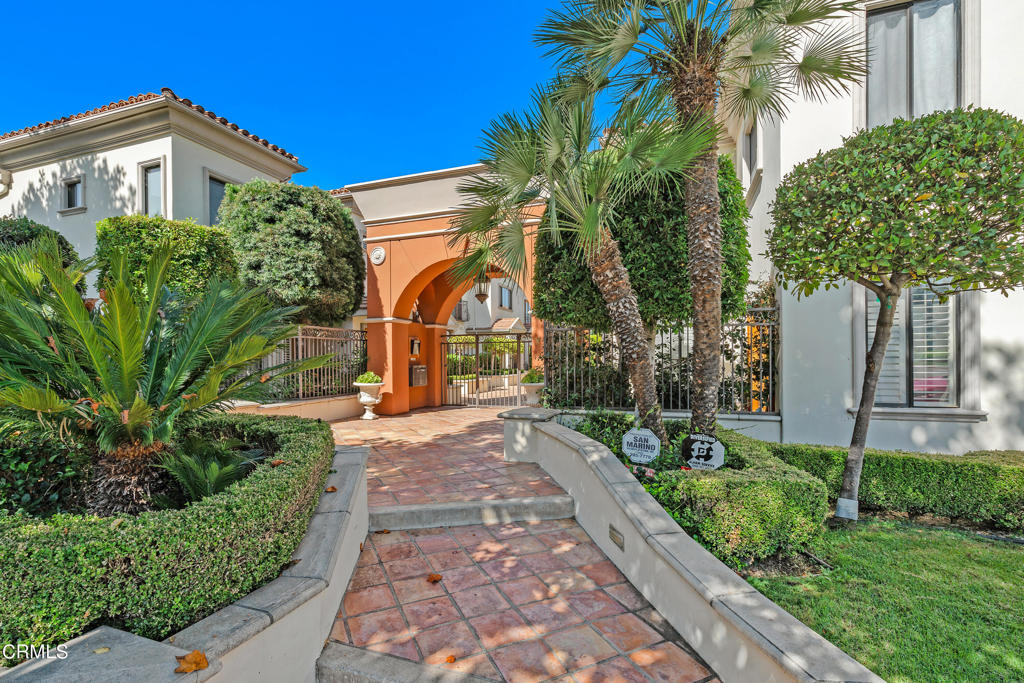 Nestled in Pasadena's coveted district of Madison Heights, this private gated Italian-inspired Bellasino Villas townhome is situated in a beautifully landscaped, well-maintained community. Your new home is your entree to the Pasadena lifestyle, located just minutes from wonderful restaurants, shops, and major freeways, Once inside, you'll experience a light and bright living room with French doors that open to a private patio, where a fountain adds a tranquil sound, enhancing the serene atmosphere. High ceilings and a gas double-sided fireplace shared with the formal dining room create an ambiance perfect for entertaining or cozy evenings. The open gourmet-style kitchen features stunning Viviano brass polished marble flooring, granite countertops, stainless steel appliances, and a breakfast bar that segues smoothly into the dining room. Elegant brass light fixtures throughout the home enhance its sophistication.Upstairs, you'll find a spacious primary suite featuring a bedroom, a full bathroom with dual sinks, two closets, and a Juliette balcony overlooking the courtyard. Also upstairs is a mini suite with a bedroom, full bathroom, and closet. The upstairs laundry closet is conveniently located in the hallway.The downstairs third bedroom, with a walk-in closet, is perfect for guests or a home office. Additional amenities include a two-car attached garage with private entry, recessed lighting, air conditioning, beautiful architecture, and a peaceful neighborhood.Enjoy a short distance to Cal Tech, Old Pasadena, Huntington Library, Trader Joe's, coffee houses, public schools, medical offices, Metro, public transportation, the Rose Bowl, PCC, 110 and 210 freeways.
