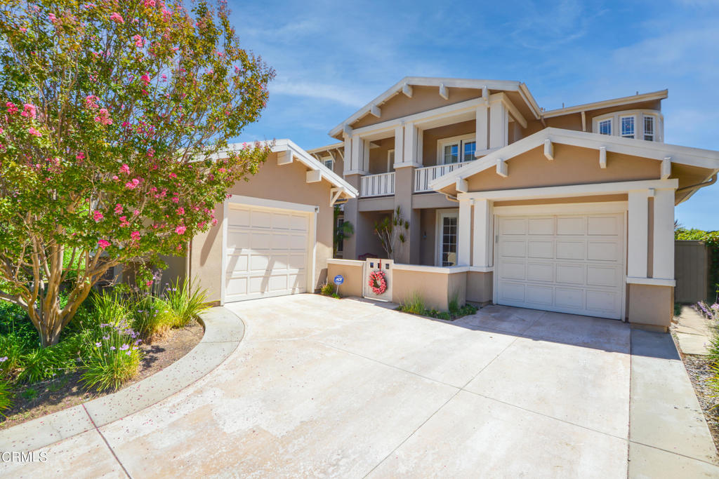 Welcome to this stunning home located in the serene La Vina gated community in Altadena. This two-story, four-bedroom, three-bathroom home offers luxury and comfort where nature meets elegance. A charming private courtyard welcomes you to the first level where you immediately feel the magic of the new walnut hardwood floors flirting with the natural light and creating a warm and inviting atmosphere. To your left you'll find a sophisticated living room adjacent to a versatile bedroom which can be converted to an office. To the right, a bright and elegant dining room sits by a French door, allowing sunlight to flood the space. Nearby, a convenient bathroom and a private laundry room offer direct access to one of the garages. At the heart of the home, a spacious family room with an elegant custom made fireplace adorned with decorative tiles, emanating charm and comfort. This space seamlessly flows into the updated kitchen, which boasts high-quality appliances, a kitchen island with seating, a pantry, and an additional dining area. French doors open from the kitchen to a spacious patio, where you can enjoy breathtaking mountain and panoramic city views, perfect for relaxation and entertaining. Upstairs, one bedroom features a balcony overlooking the mountains, offering a tranquil retreat. Another bedroom, with a stunning window view, shares a full bathroom. The primary bedroom is a true sanctuary, complete with a custom design closet, a private balcony with sweeping views and a bathroom featuring a separate shower, a spacious bathtub, dual sinks and a vanity counter. All bedrooms are equipped with custom-made California closets. The home also includes two single-car garages with brand new epoxy floors. The gated community offers a range of amenities including a beautiful swimming pool, playground, paths and trails leading to the Angeles National Forest. Just outside the community is Loma Alta Park featuring playgrounds, tennis courts, equestrian park and a weekly farmers market. Minutes to Old Town Pasadena and 15 miles to DTLA. This home is the perfect blend of elegance and convenience.