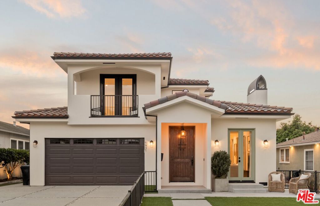Step into unparalleled luxury with this stunning two-story Santa Barbara Spanish-style residence in coveted North Kentwood. This modern marvel features an expansive open floor plan, encompassing four lavish bedroom suites and an enclosed office (which can easily serve as a fifth bedroom), all imbued with an air of sophistication and contemporary flair. The front yard, enclosed and beautifully landscaped with turf grass, features a charming covered porch and French doors that seamlessly connect the formal living room to a serene, private patio. Inside, the living area is graced by a cozy fireplace, soaring high ceilings, and an abundance of cascading natural light. A beautifully crafted decorative wainscot wall, a chic chandelier, and a spacious dining area elevate every meal into an experience. For the culinary enthusiast, the custom kitchen is a dream come true. It boasts a grand kitchen island, a bespoke pantry, top-of-the-line stainless steel appliances, and a charming breakfast nook. French glass doors open to the backyard, creating a seamless flow for indoor-outdoor living. The adjoining family room, with its custom-built media cabinets and bookcases, is perfect for both entertaining and unwinding. Step outside to the expansive deck overlooking your own private paradise. The backyard oasis features lush turf grass, a built-in BBQ kitchen, a firepit lounge area, and a sparkling pool with built-in bench seating and a soothing waterfallideal for both lively gatherings and tranquil retreats. Convenience meets elegance with a main floor bedroom suite and a stylish powder bathroom. Ascend the split-level staircase to find a sunlit upper foyer leading to three additional ensuite bedrooms and the versatile enclosed office. The primary suite is a true sanctuary, complete with a walk-in closet adorned with custom built-ins, a luxurious en suite bathroom featuring a soaking tub, a separate shower, dual sinks, and a private deck overlooking the serene backyard. Situated in prime Westchester, moments from Playa Vista, Loyola Bluffs, and the Pacific Ocean, this home offers the pinnacle of luxury living with effortless access to local shops, dining, and major freeways throughout the vibrant westside area.